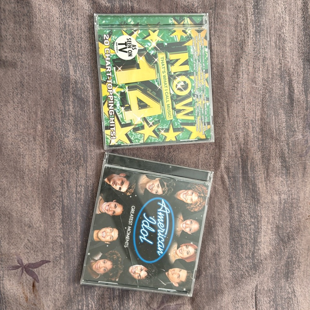 CD bundle - Now That’s What I Call Music 14 and American Idol Greatest Moments.